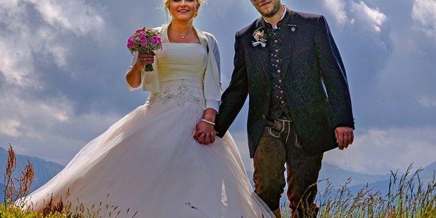 Hochzeitsfotos - Natascha und Tobias: Echte Bayern feierten zünftig auf der Planai.
Die schönsten Erinnerungsbilder wie immer von FotoTOM - TOM Eitzinger
