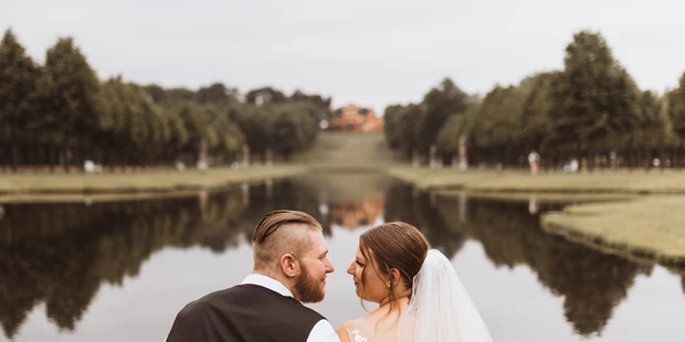 Hochzeitsfotos - Stralsund - Ein Brautpaarshooting am Schweriner Schloss. - RISPA-Fotografie